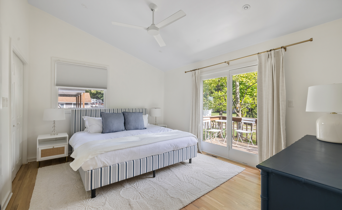 The primary bedroom is on the main level & has a king-size bed.