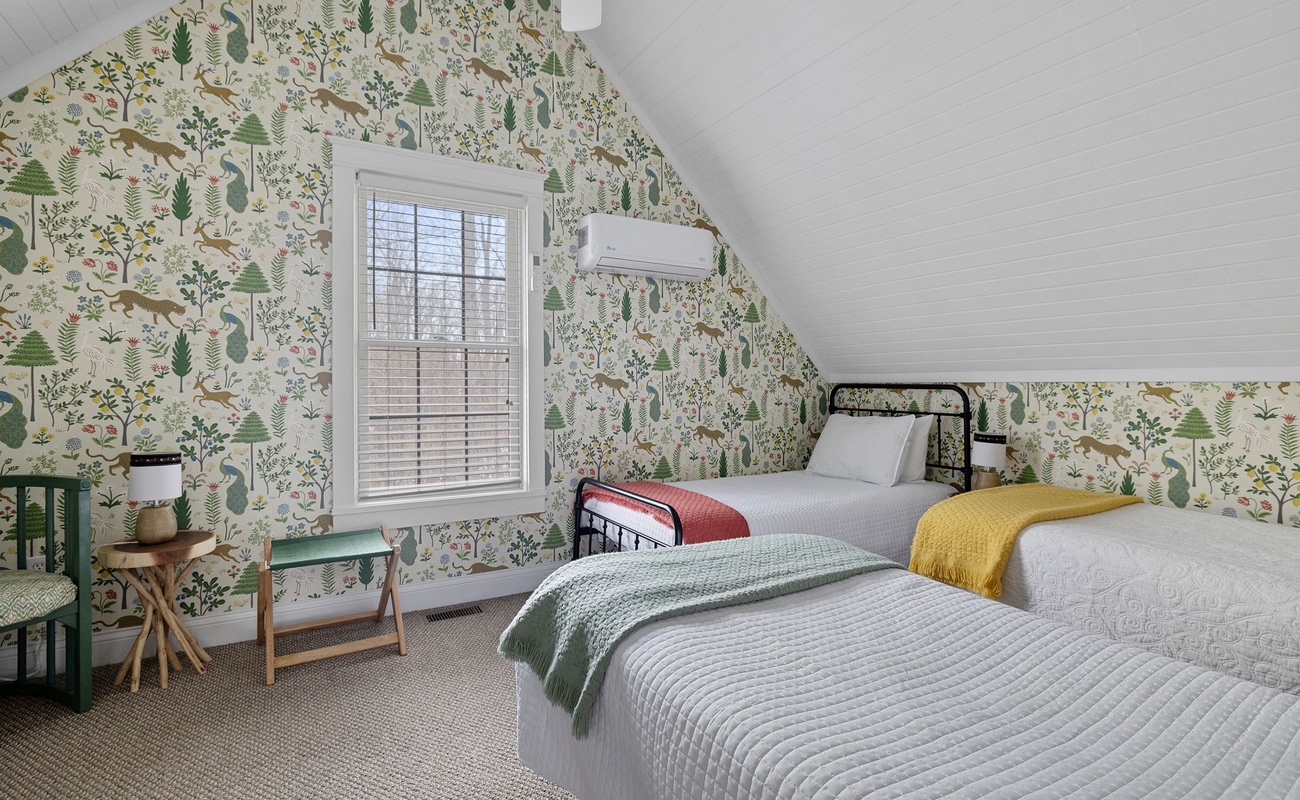 Bedroom 3 is on the upper level & has 3 twin-size bed.