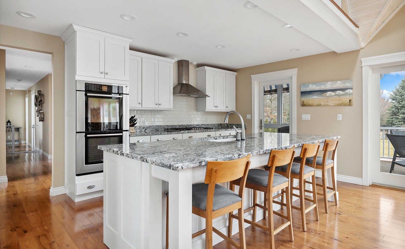 Pull up a stool and enjoy a casual meal or quick snack at the kitchen island.
