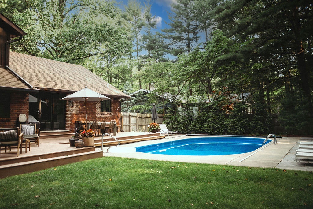 This retreat is for pool time, sunbathing, and unwinding under the trees.