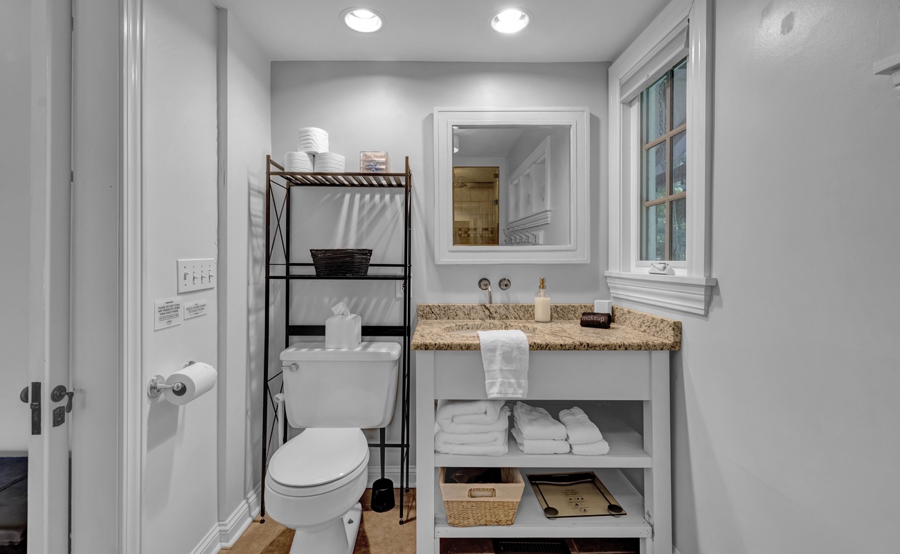 Stocked, stylish, and sparkling with woodland window views.