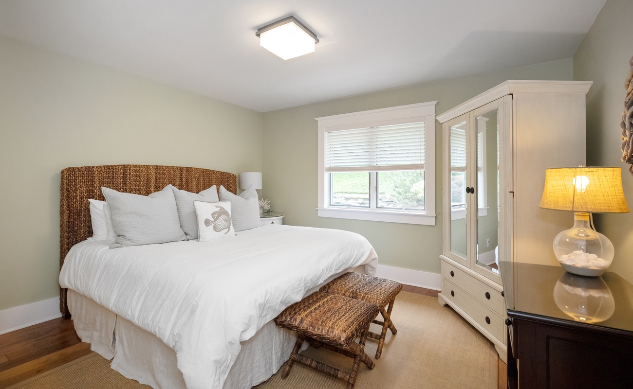 Bedroom 4 is on the main level & has a king-size bed.