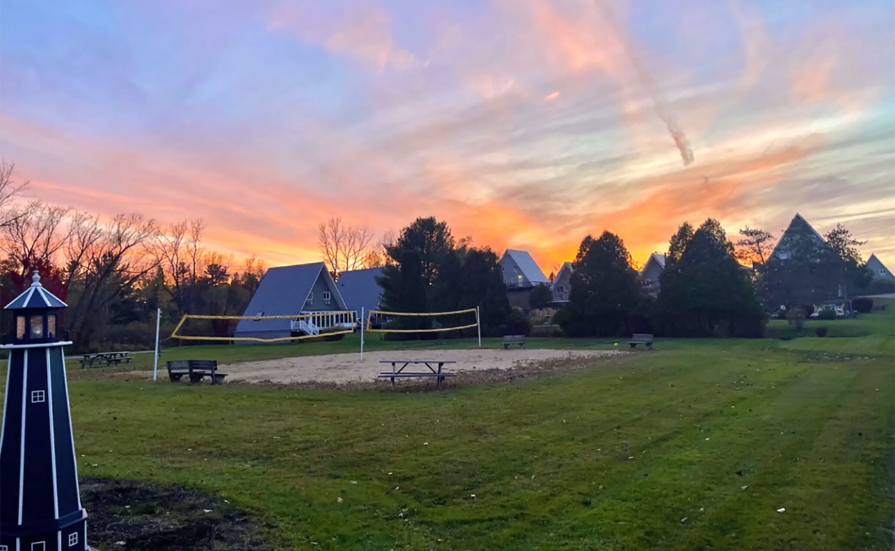 Feel the sand between your toes as you engage in a game of beach volleyball.
