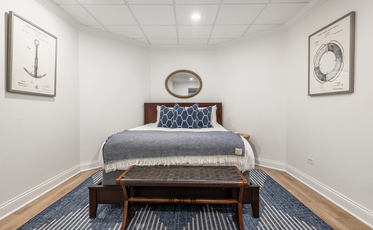 Other sleeping area is on the lower level & has a queen-size bed.