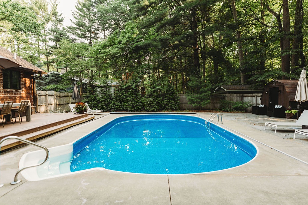 Dive in, stretch out, and enjoy the privacy of the forest-framed pool.