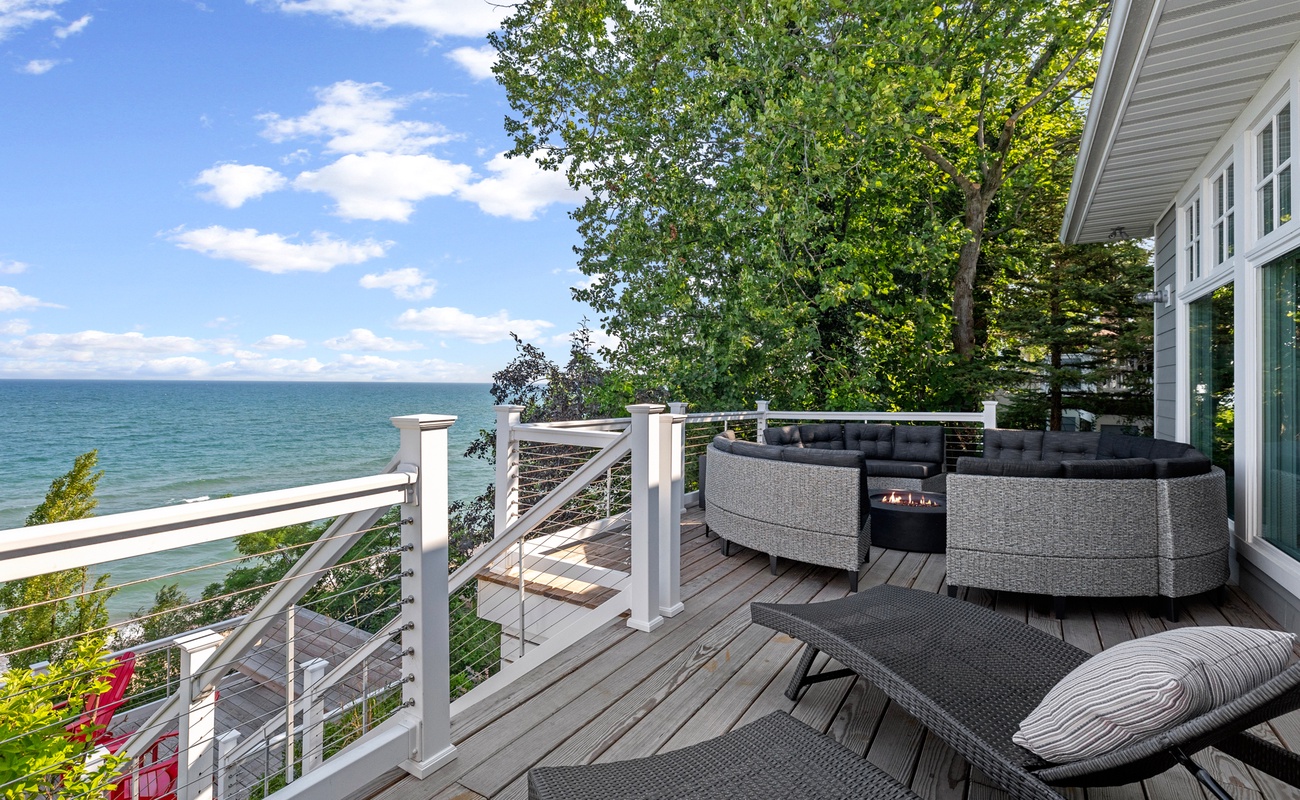 Enjoying the serene view of the ocean from this beautiful deck.