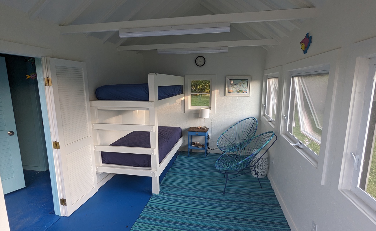 Cool off in the cozy poolhouse for games, reading, and mid-swim breaks.