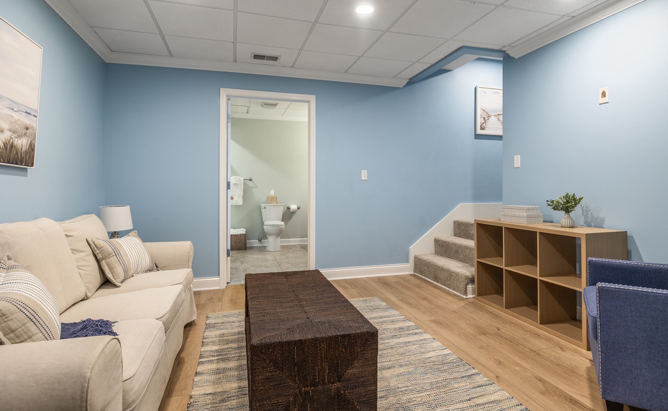 Need a break from the action upstairs? This cozy nook is your go-to for calm and comfort.