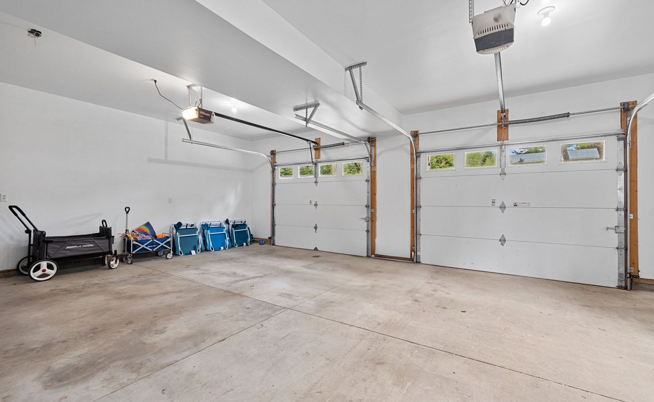Room for cars, gear, and so much more—this garage is ready for action!