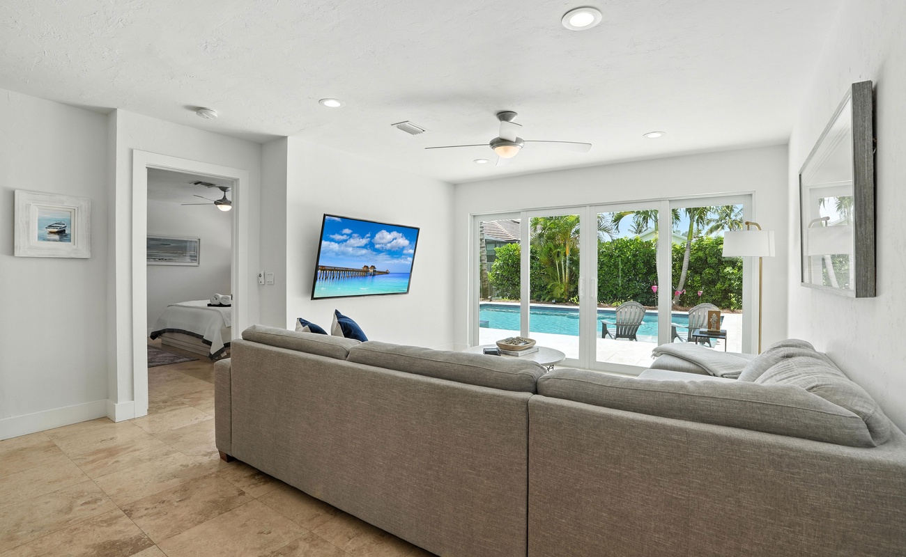 Lounge in comfort with the pool just steps away.