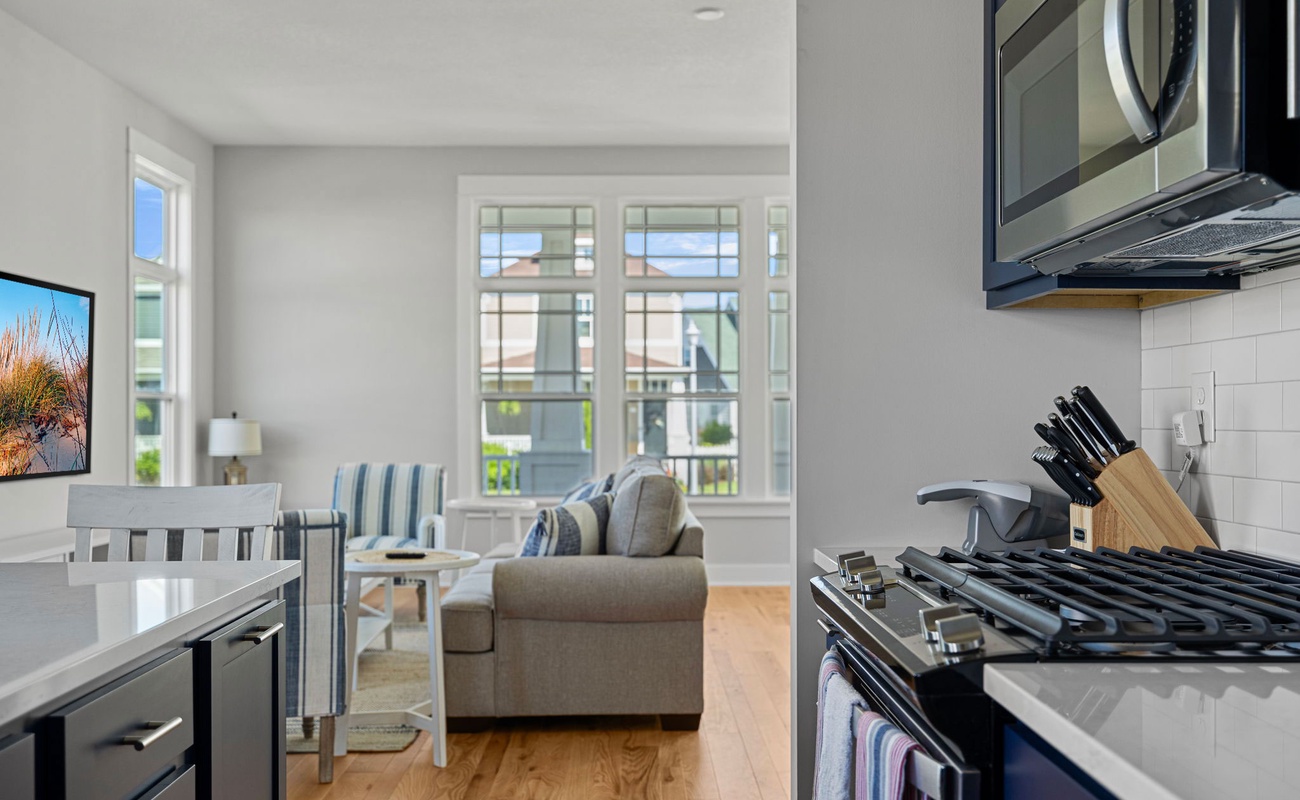 The open design makes for an easy living room-to-kitchen trip. Snack, anyone?