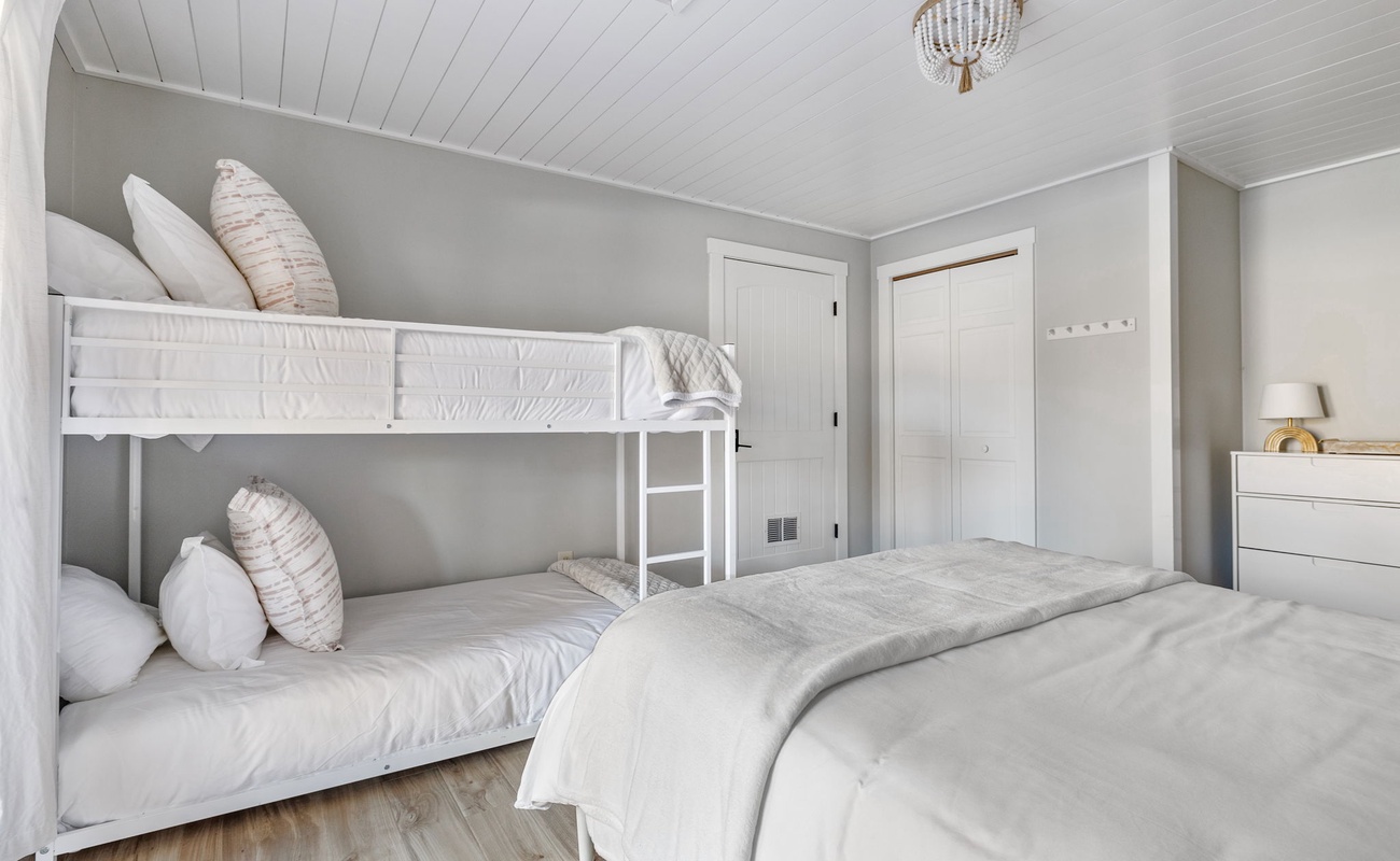 Bedroom 8 is on the lower level & has queen-size bed and twin-size bunkbeds.