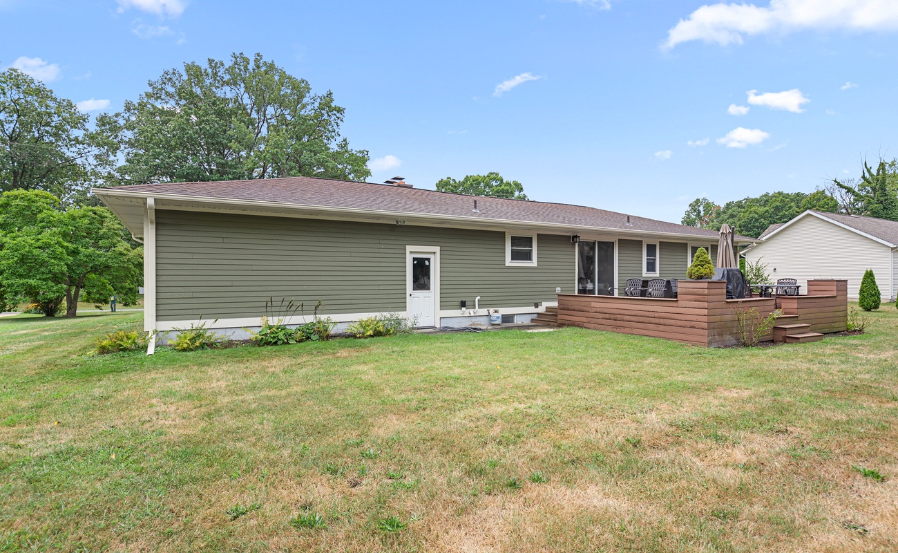 Enjoy endless summer nights on your spacious deck and fun-filled days in the yard.