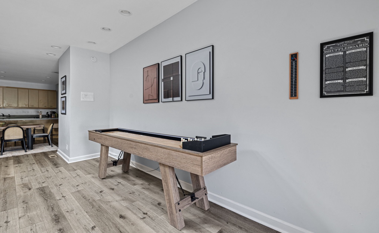 Ready, set, shuffle! Bringing the fun home with this awesome shuffleboard table.