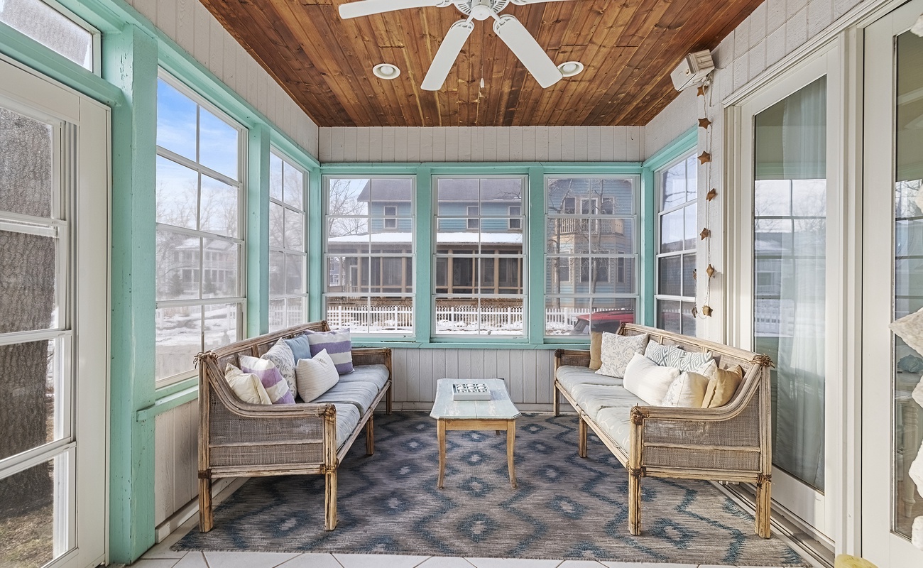 Lounge comfortably in our bright, coastal chic sunroom.