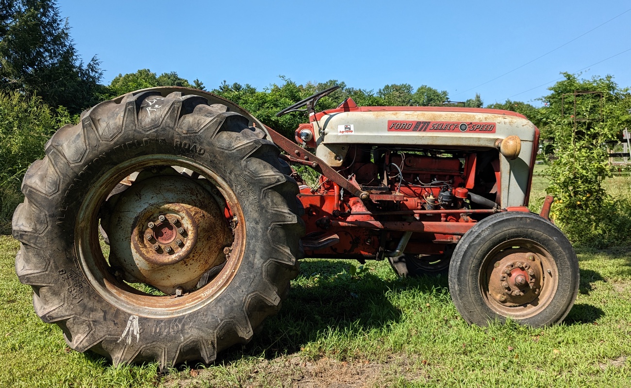 Farmstead character at Berrywood Farm, complete with our vintage tractor mascot.