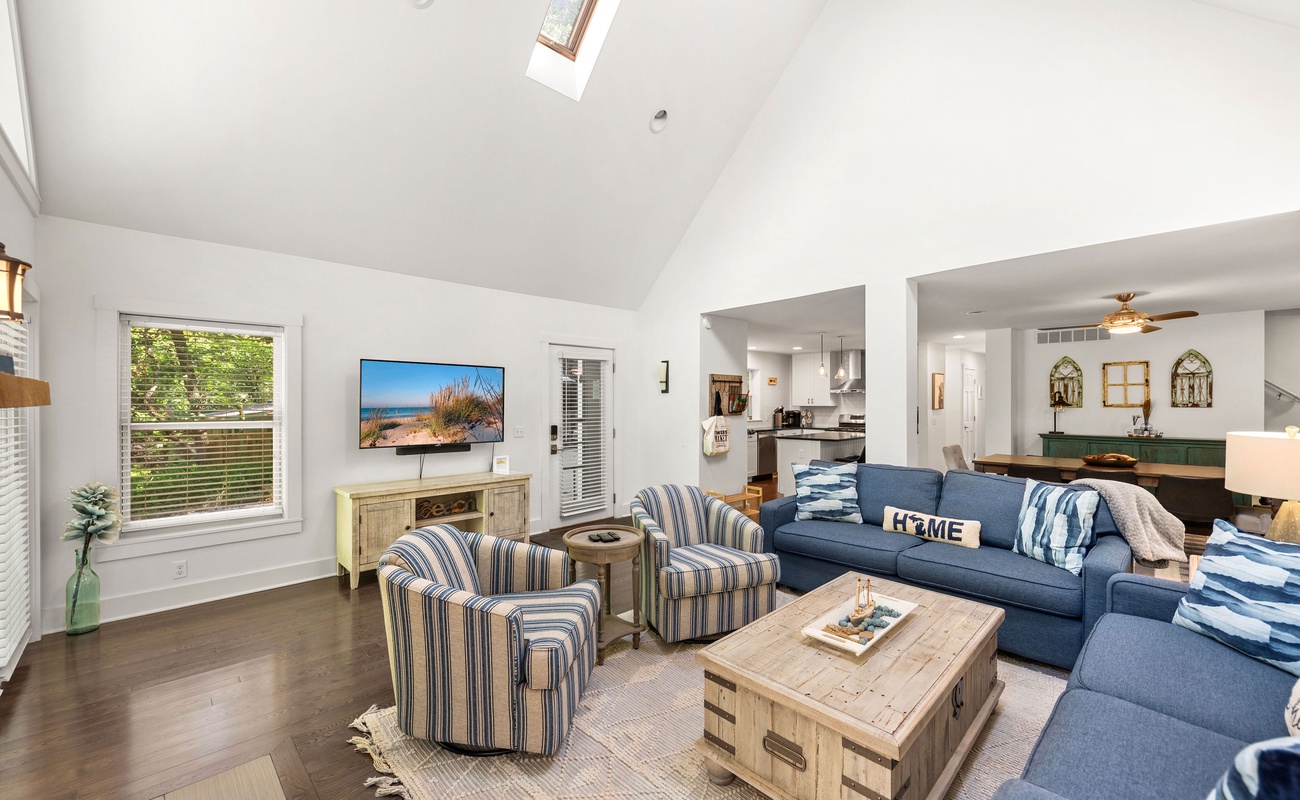 Cozy up beneath the vaulted ceiling glow.