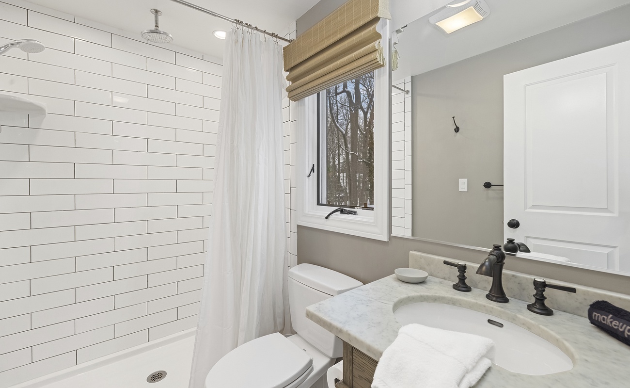 Our bright bathroom is designed for comfort, convenience, and easy routines.