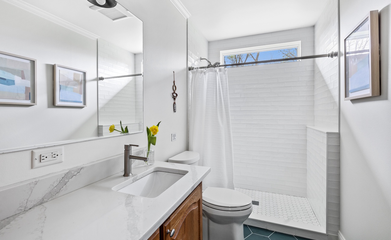 Refresh in the well-appointed bathroom, equipped with all the essentials.