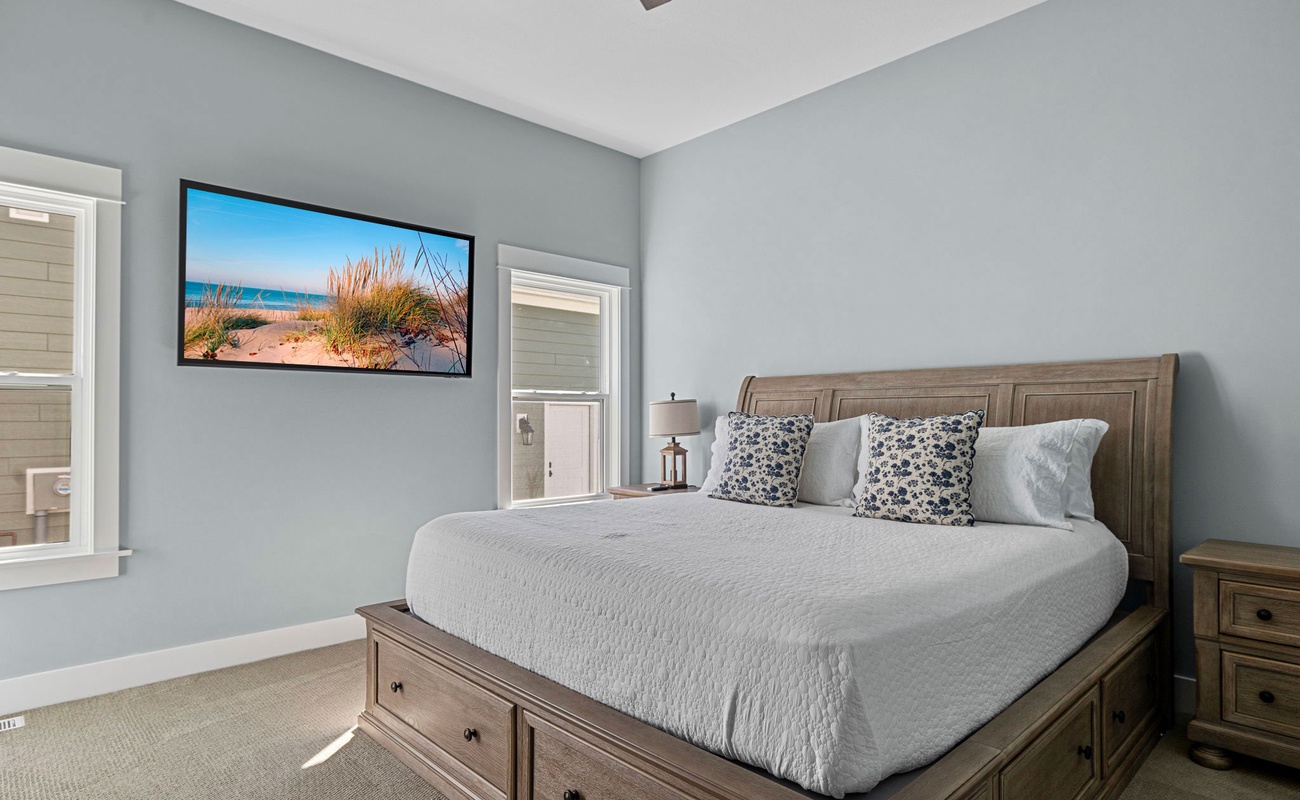 Primary bedroom is on the main level & has a king-size bed.