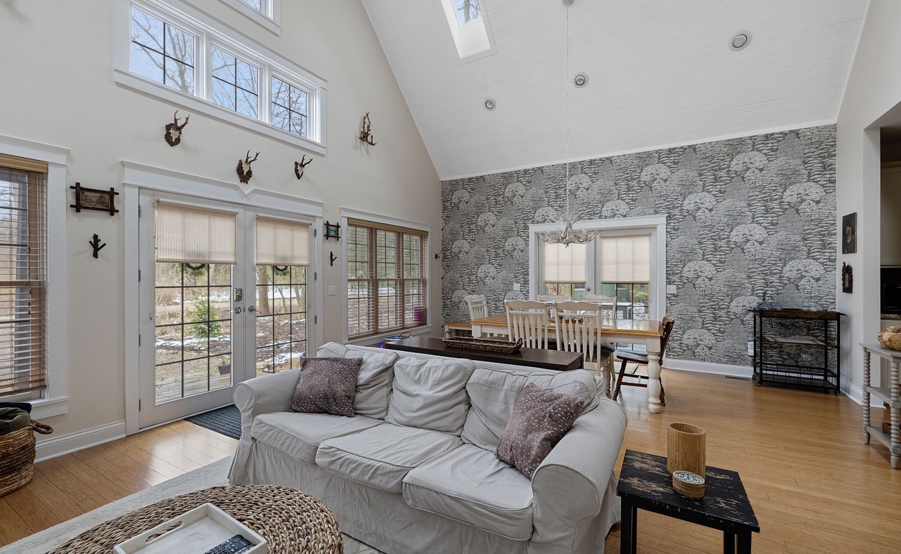 Vaulted ceilings, skylights and French doors - magnificent, naturally lit space!