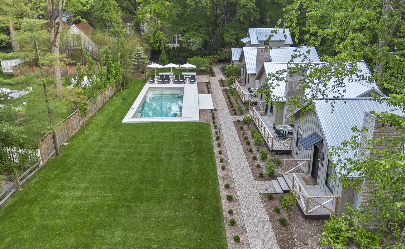 Loving the peaceful vibes of the backyard oasis - pool, sun, and greenery as far as the eye can see!