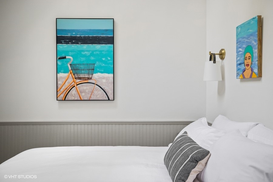 Bedroom 2 is on the main level & has a queen-size bed.