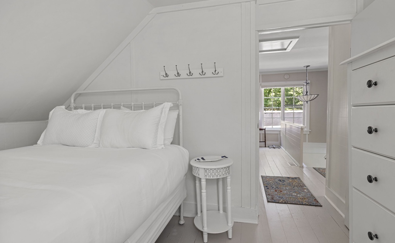 Bedroom 4 is on the upper level & has a queen-size bed.