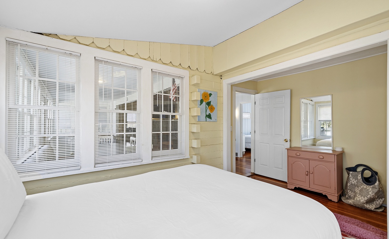 A sunny bedroom where warm tones and quiet mornings meet.