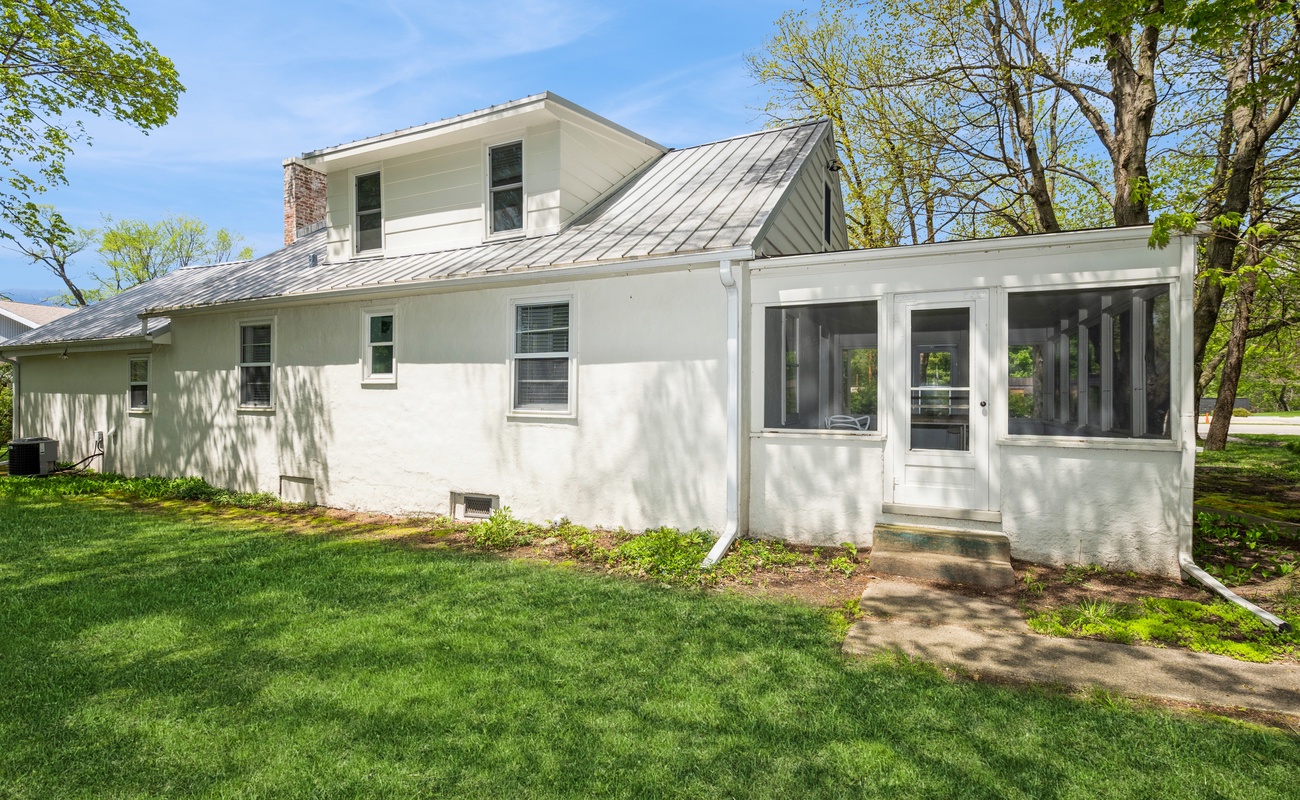 Bright, clean lines and a screened-in porch perfect for peaceful afternoons.