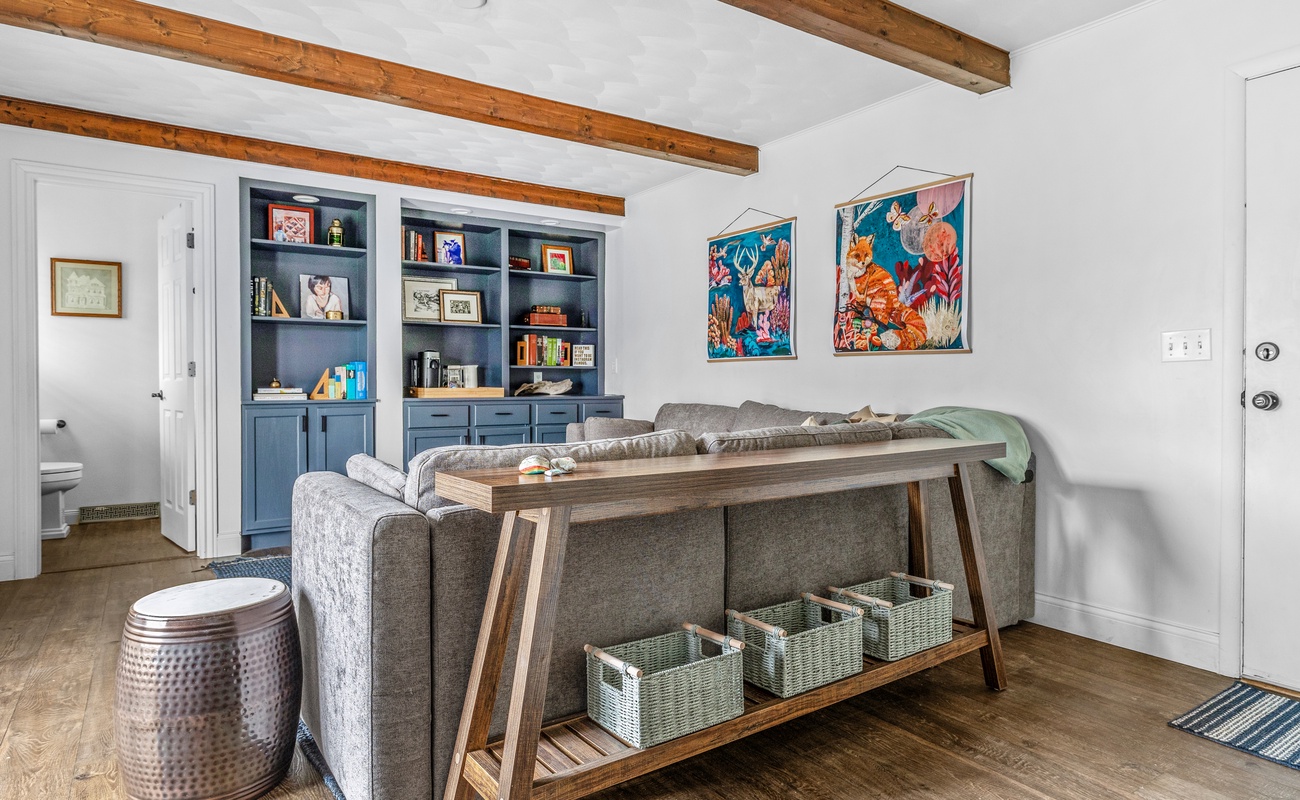 Stylish and spacious living with artistic vibes. The perfect space for game nights or a quiet escape.