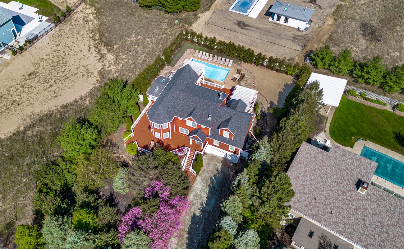 From tree-lined drives to poolside afternoons, this one-of-a-kind home is a memory-making haven.