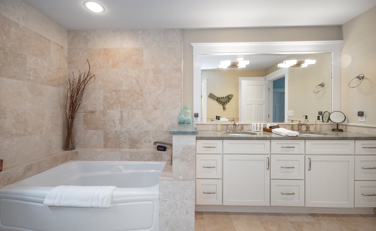 Luxurious tile and deluxe fixtures highlight the rich Ensuite Master Bathroom.