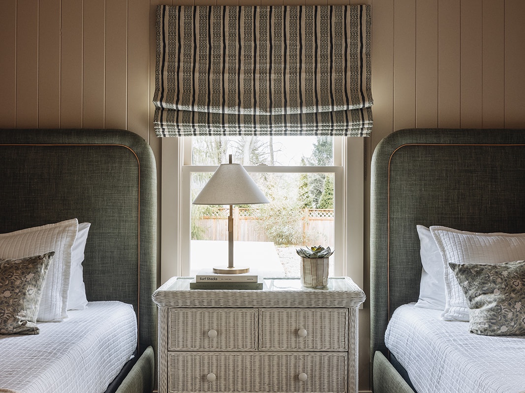 Matching twin beds in the same room as the bunk beds? Some fun will be had.