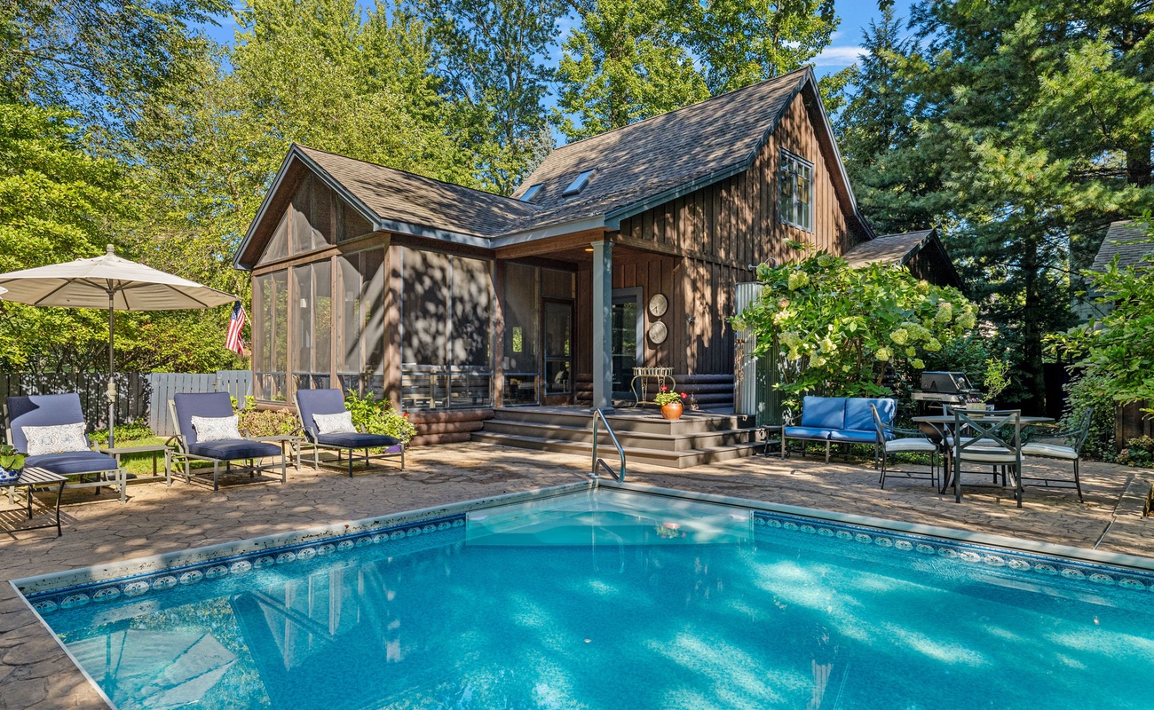 Relax on the screened porch while taking in the views.