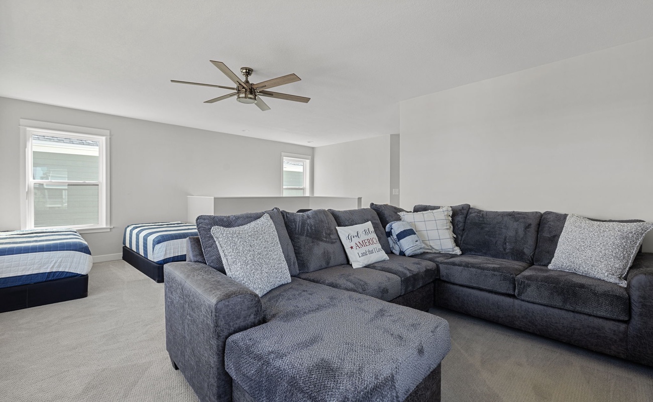 We hear our guests love this plush and super-comfy wraparound couch upstairs.