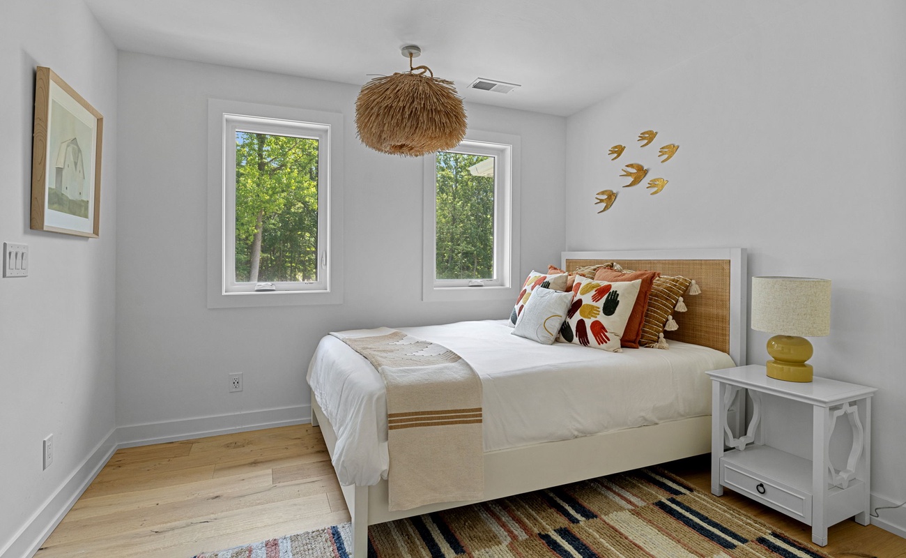 Bedroom 4 is on the main level & has a queen-size bed.