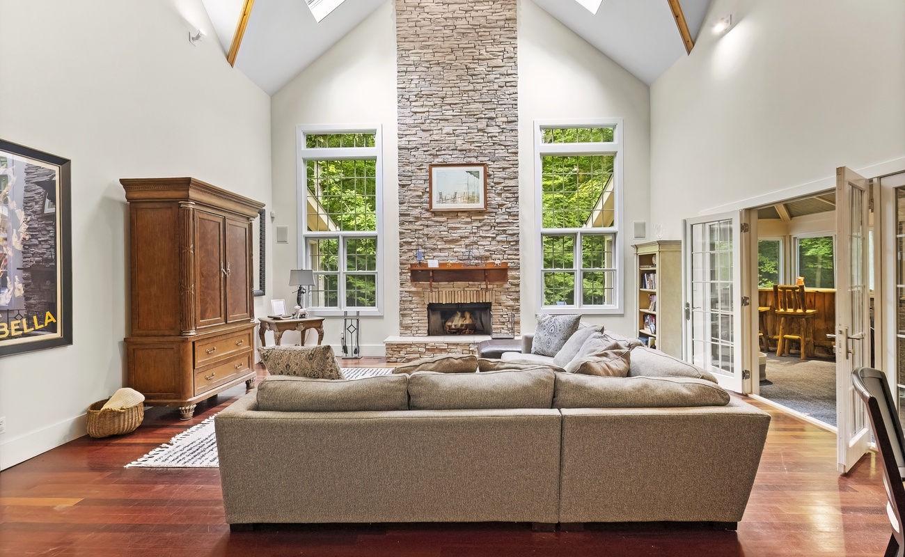 Relax under skylights in this grand, cozy retreat.
