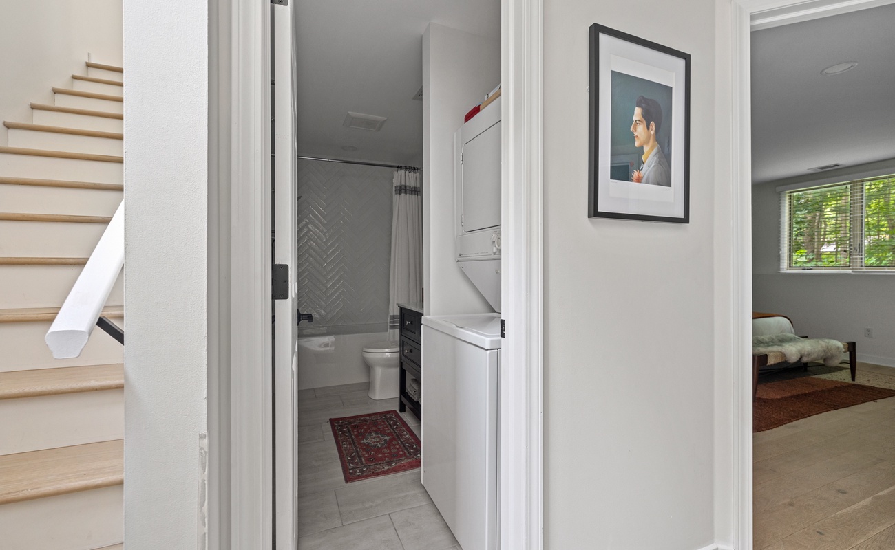 Enjoy the convenience of a washer-dryer in the master bathroom.