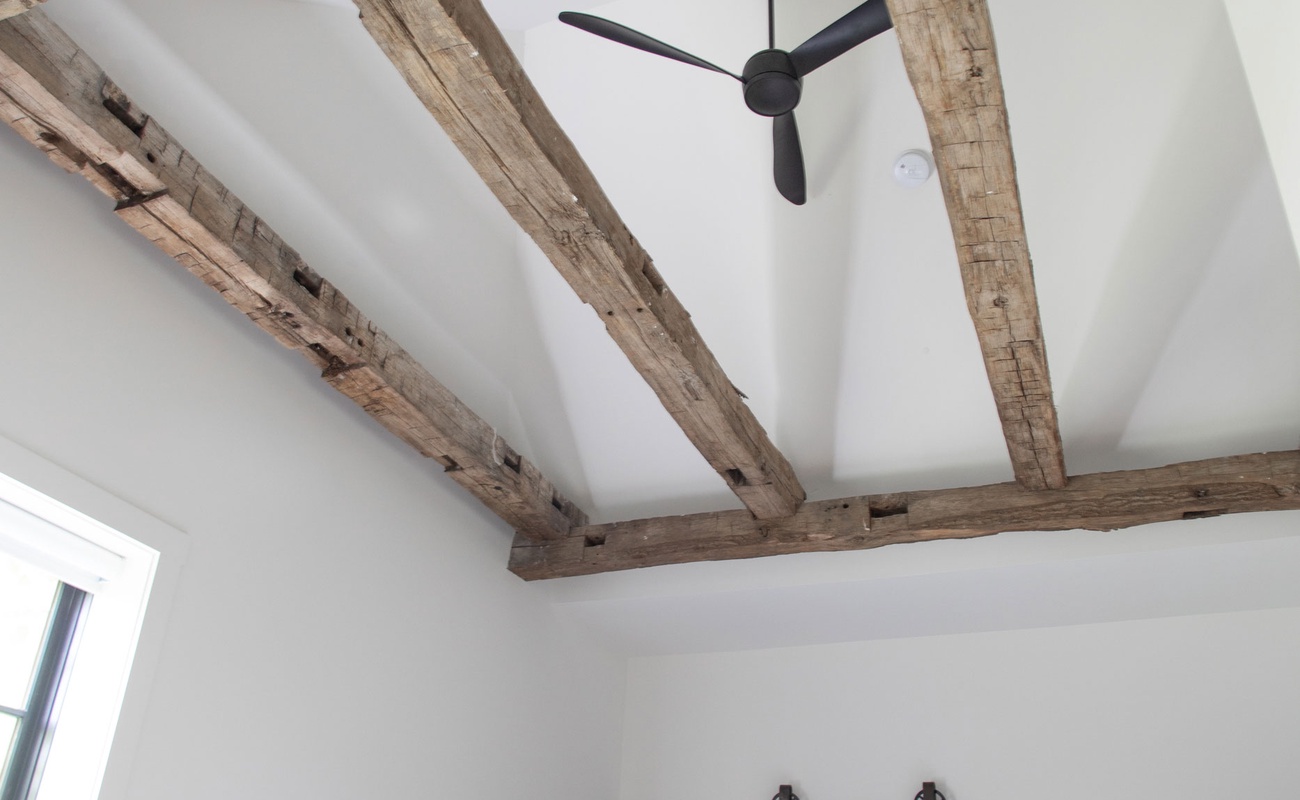 Antique beams, barn doors, and many other stylish design accents can be found throughout the home.