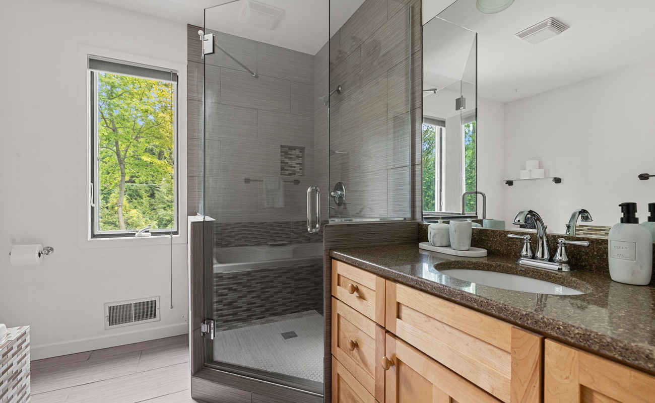 Refreshing inside and out—this bathroom brings nature to the daily routine.