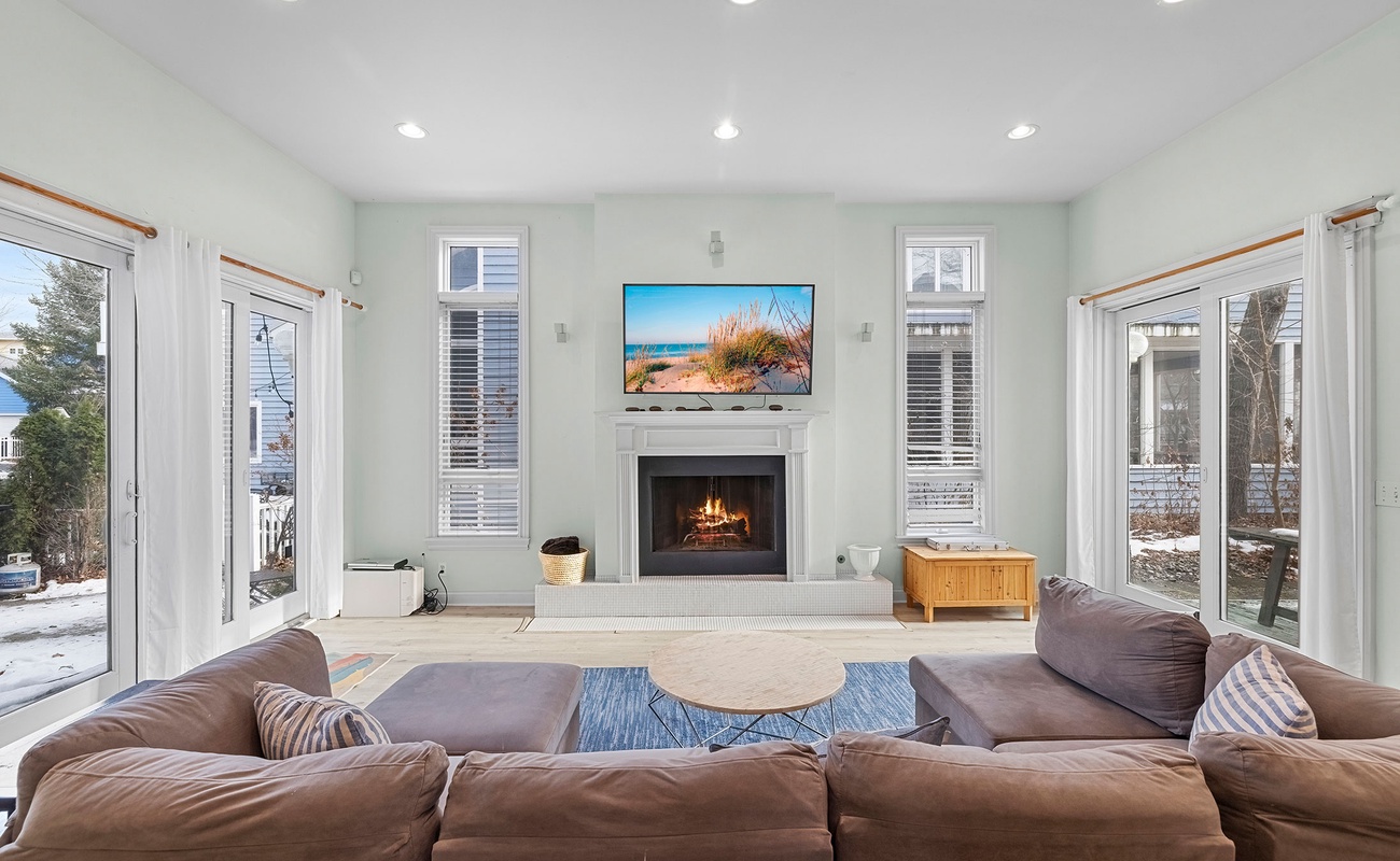 A second welcoming living room where movie nights family chats unfold. (fireplace not available for guest use)