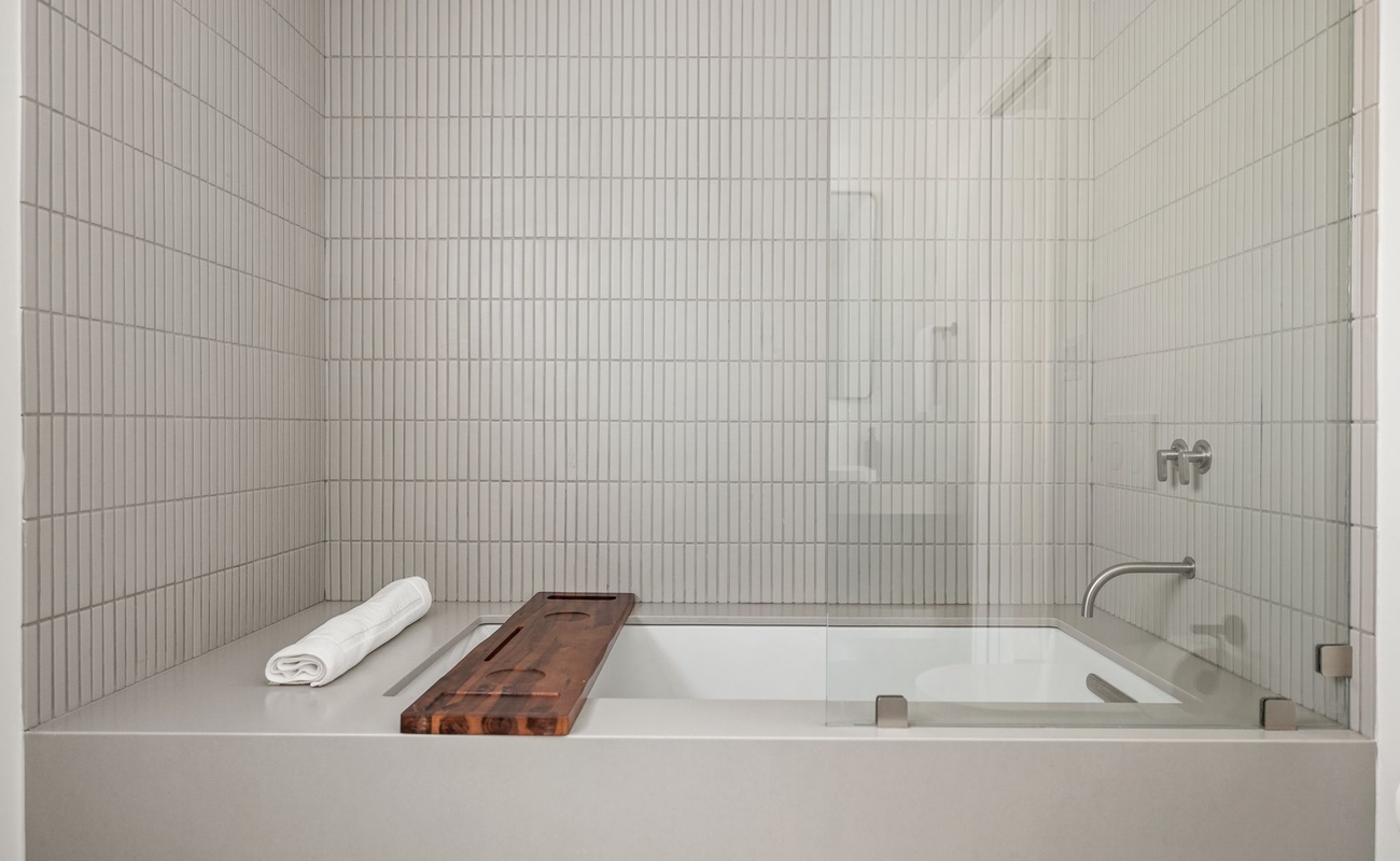 Tile perfection + bath tray essentials = your new happy place.