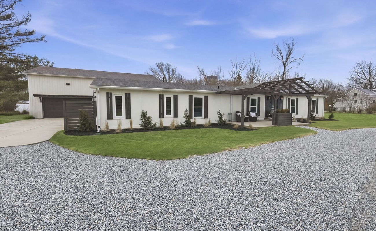 Cozy Haven sits on 2 acres in tje Three Oaks countryside.