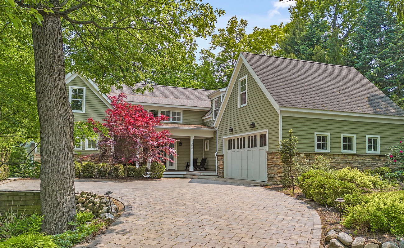 Stonework, symmetry, and serene curb appeal.