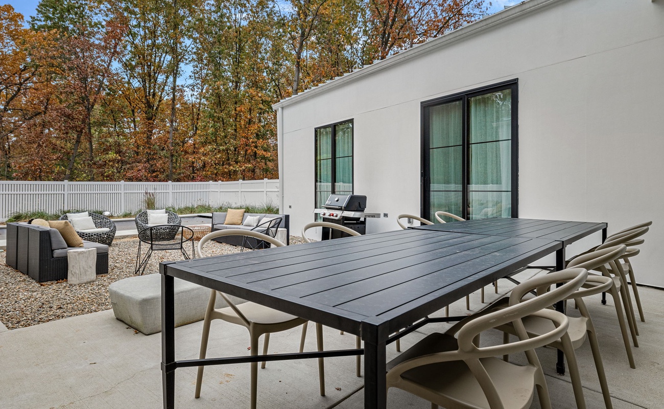 Dine under the open sky, then gather around the fire — patio perfection!