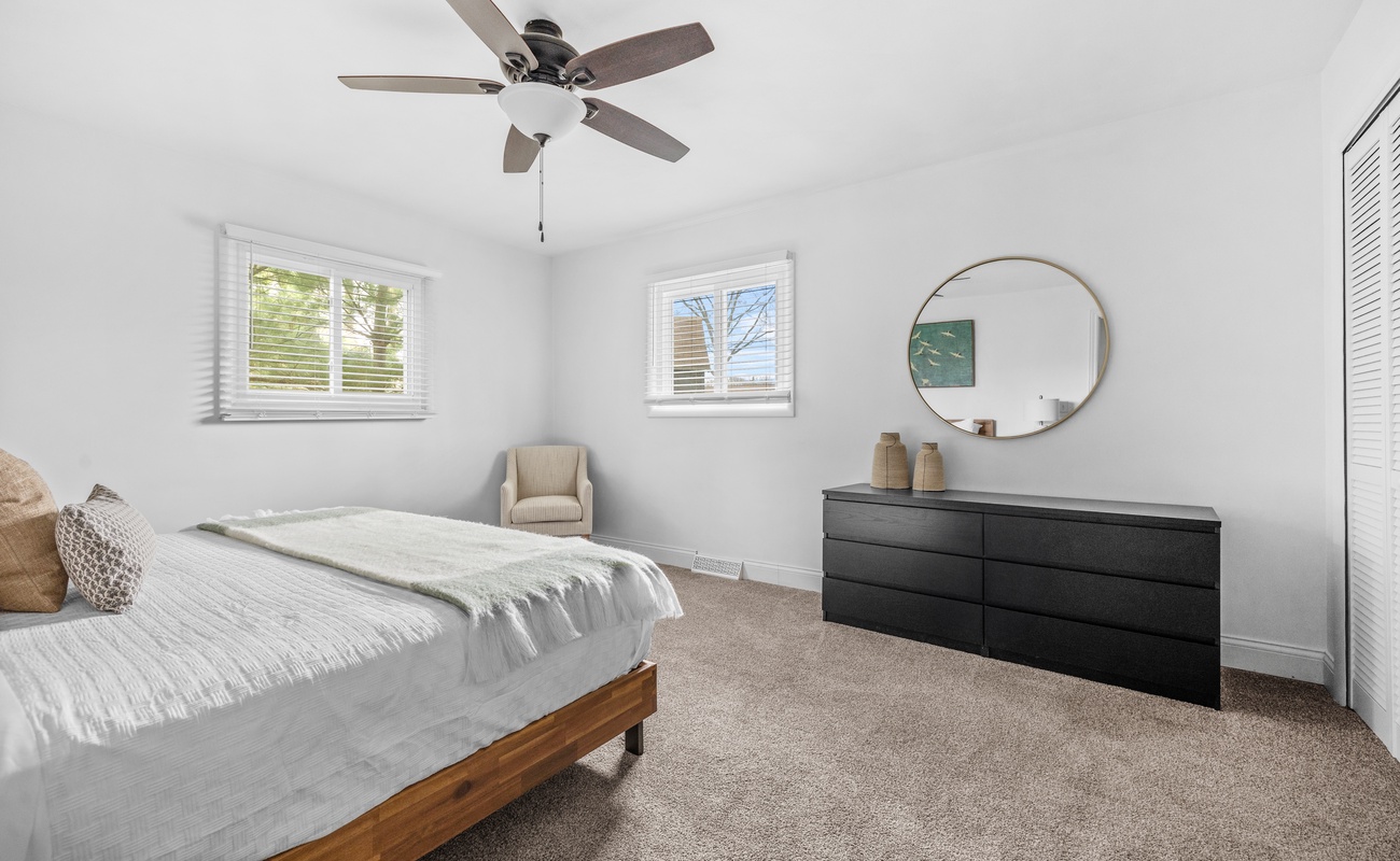 Sunny windows, plush carpet, and calm vibes for the perfect recharge!