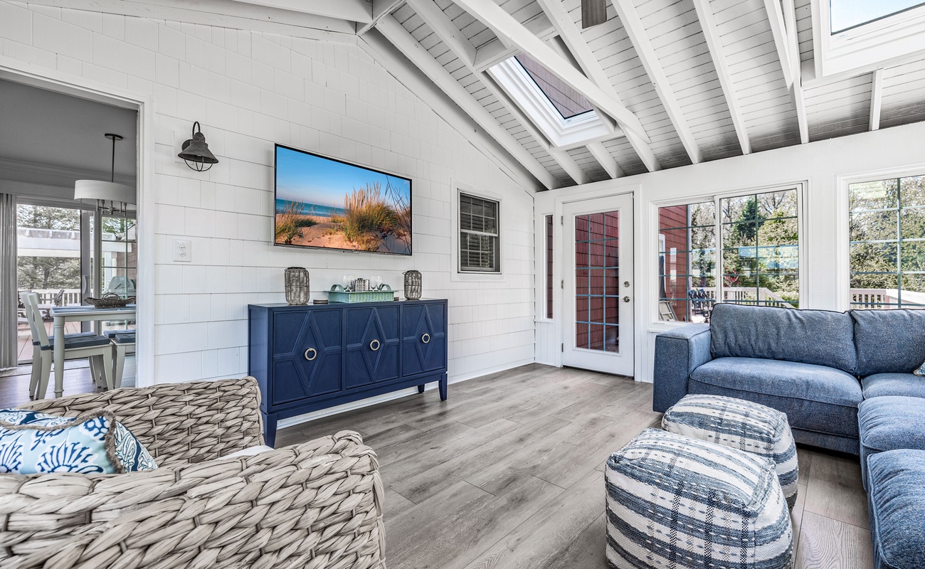 Relax under vaulted ceilings in this breezy indoor retreat.