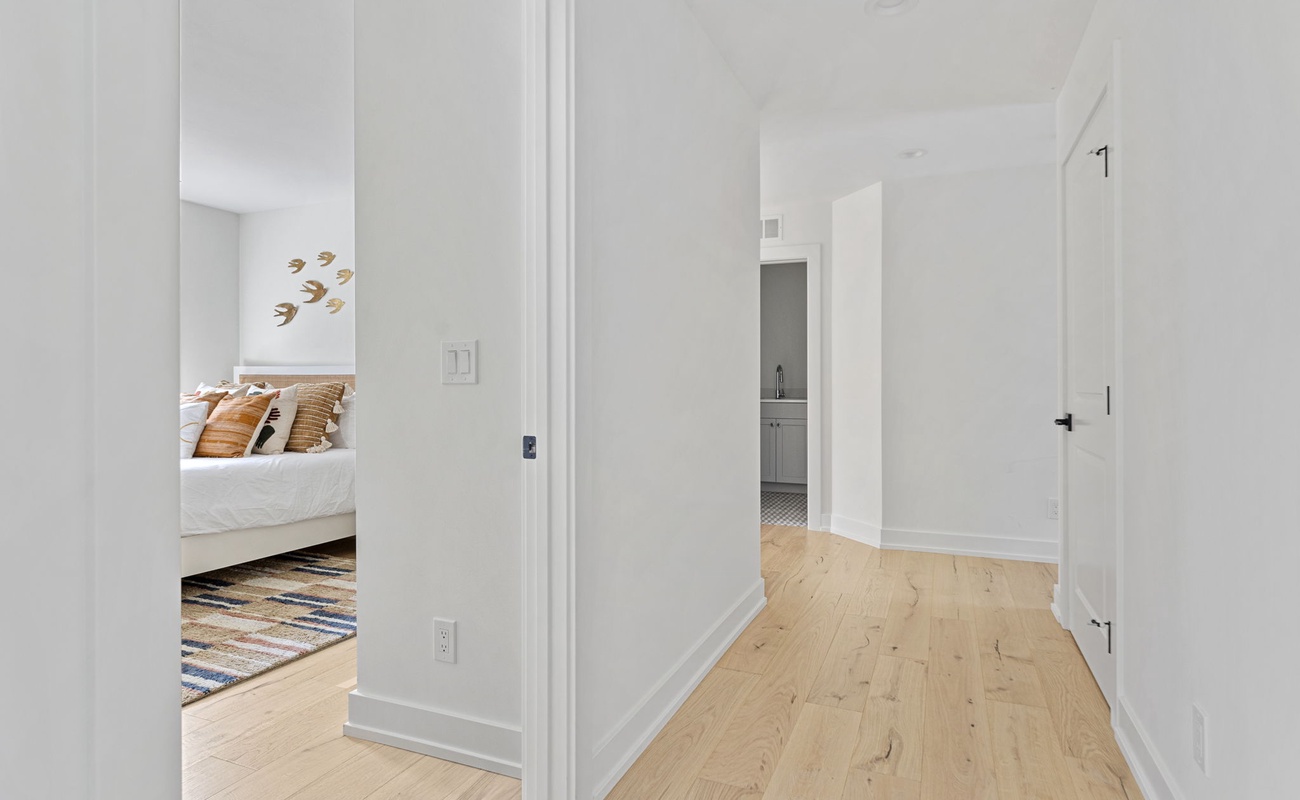 Accessibility meets elegance in this expansive hallway.