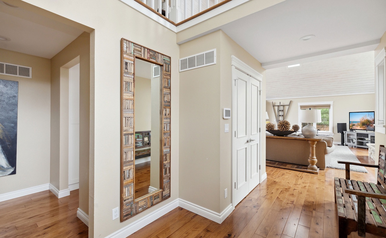 Step into the inviting living room, where modern elegance meets cozy comfort.